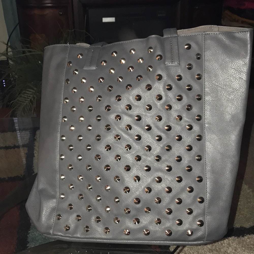 Gray studded handbag